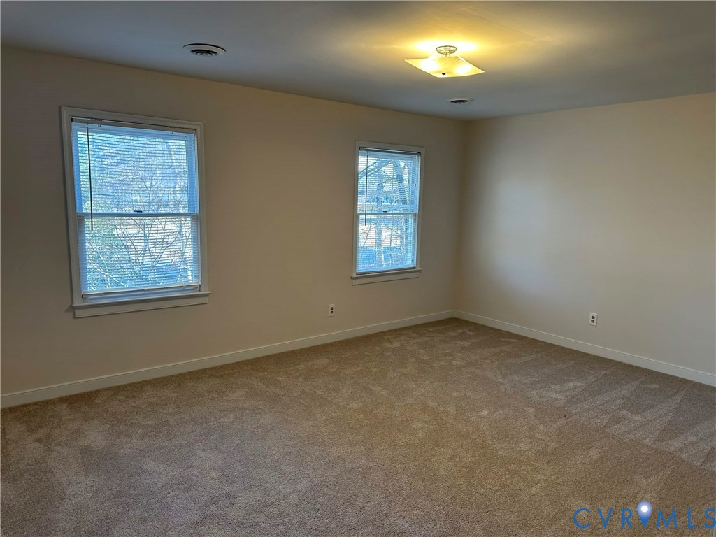 10510 Courtney Road Glen Allen, VA 23060 - Photo 25 of 32 an empty room with windows