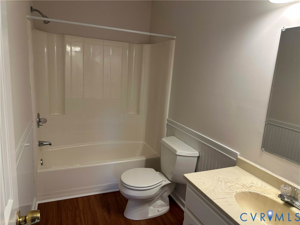 10510 Courtney Road Glen Allen, VA 23060 - Photo 26 of 32 a bathroom with a granite countertop sink toilet and shower