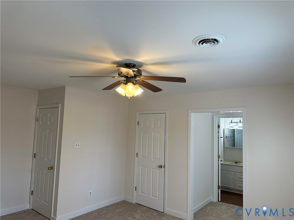 10510 Courtney Road Glen Allen, VA 23060 - Photo 30 of 32 a view of an empty room with a fan