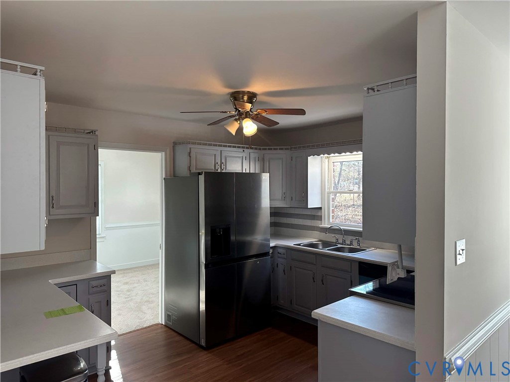 10510 Courtney Road Glen Allen, VA 23060 - Photo 5 of 32 a kitchen with a refrigerator and a stove top oven