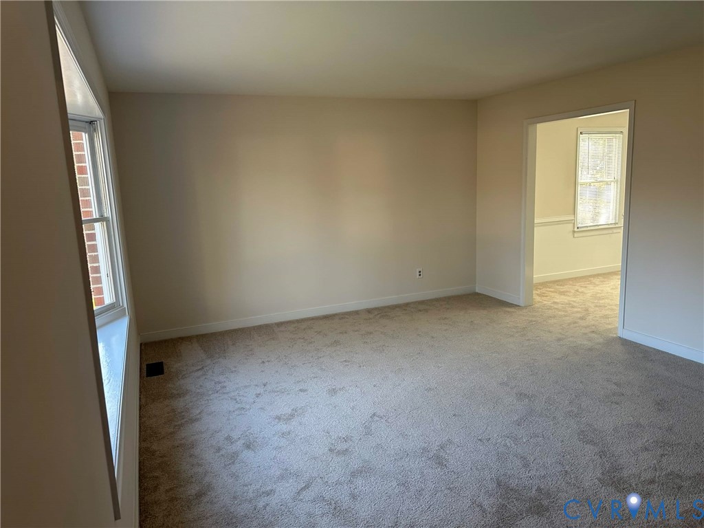 10510 Courtney Road Glen Allen, VA 23060 - Photo 7 of 32 an empty room with windows