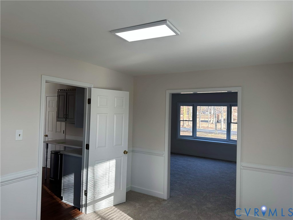10510 Courtney Road Glen Allen, VA 23060 - Photo 9 of 32 an empty room with windows and closet
