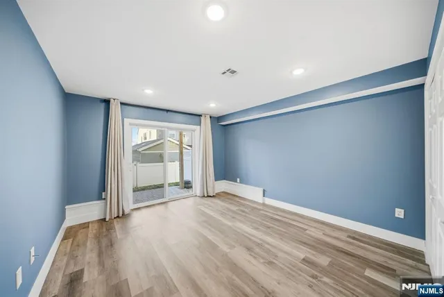 a view of livingroom with wooden floor