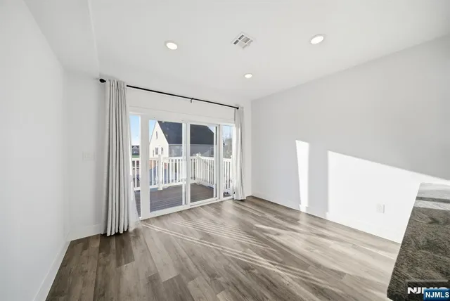 a bathroom with a toilet sink and a mirror