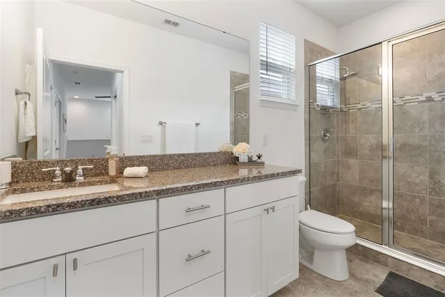 a view of workspace with wooden floor windows