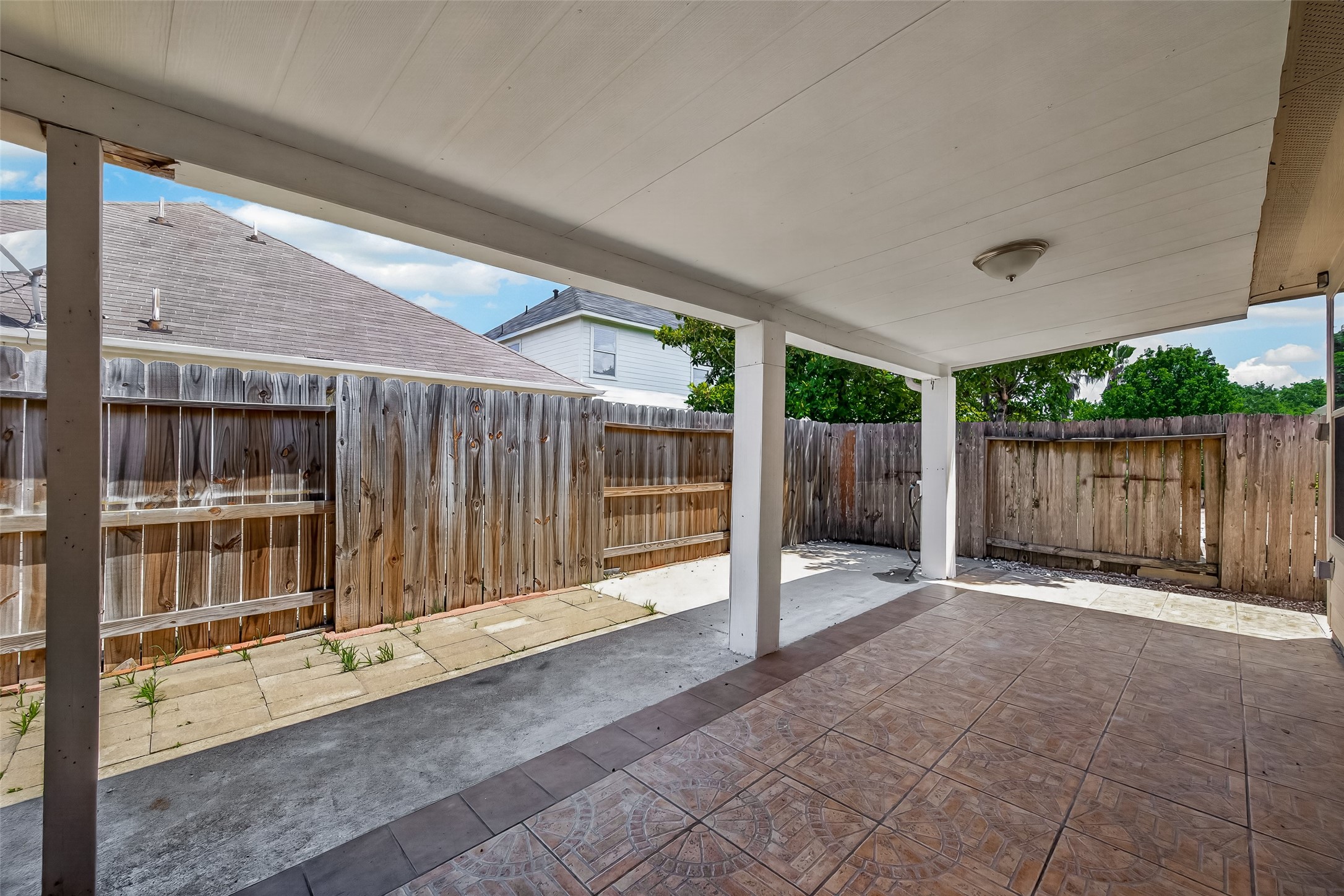 19322 Dawn Canyon Road Houston, TX 77084 - Photo 36 of 37 Covered patio area with tiled flooring,