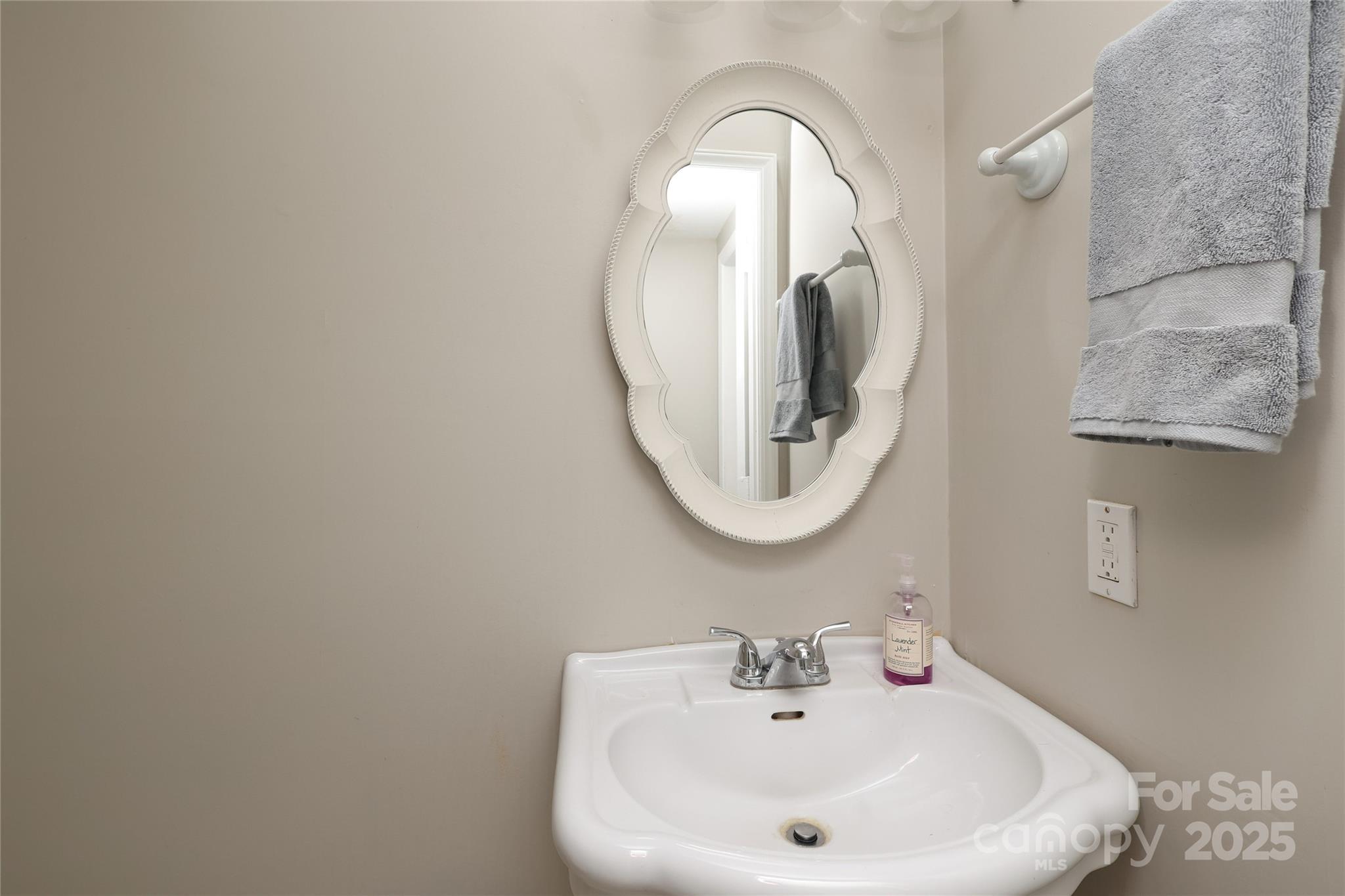 3722 Park Road, Unit B Charlotte, NC 28209 - Photo 12 of 48 a bathroom with a sink and a mirror