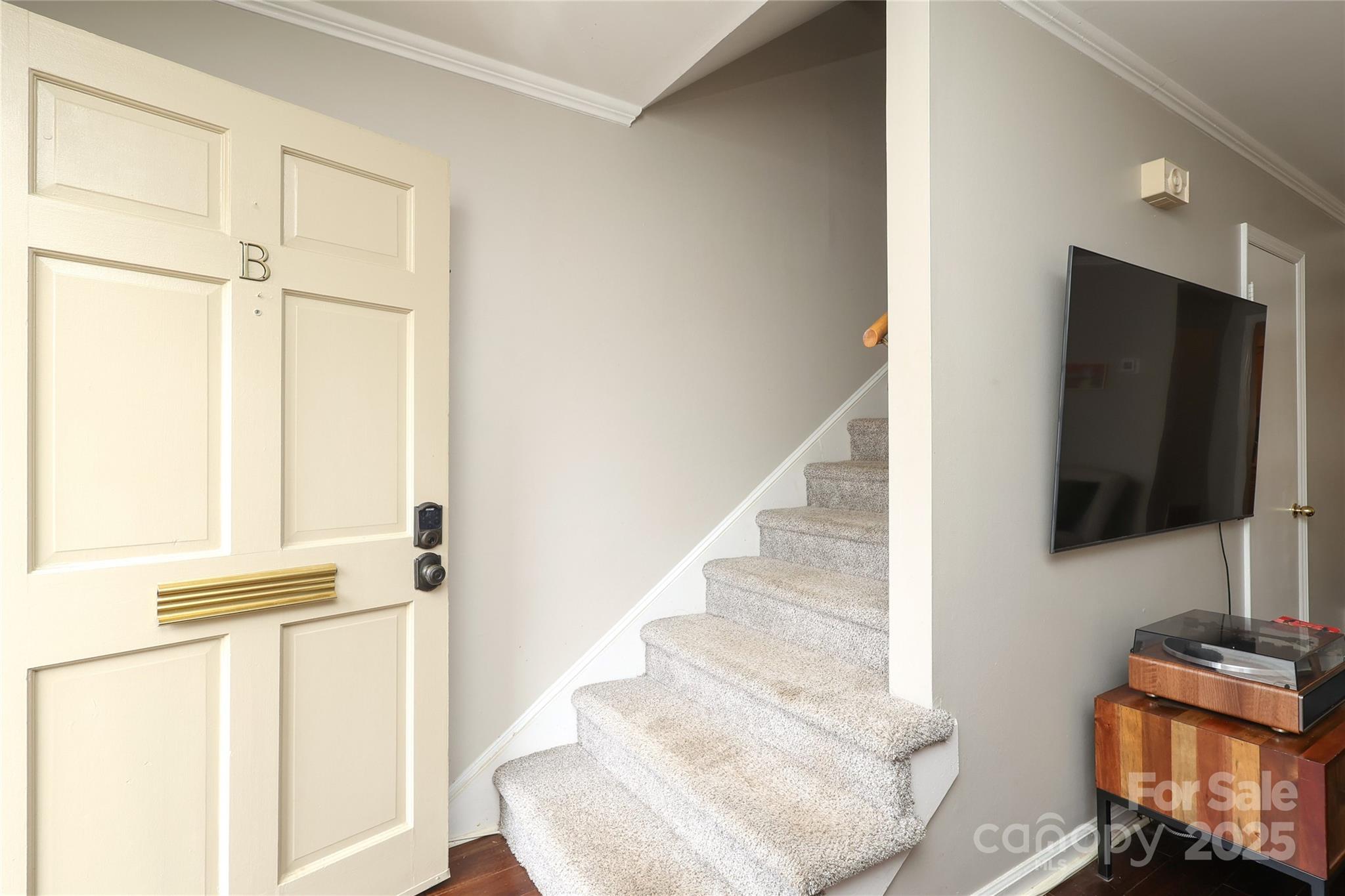 3722 Park Road, Unit B Charlotte, NC 28209 - Photo 13 of 48 a view of walk in closet with clothes and shoes