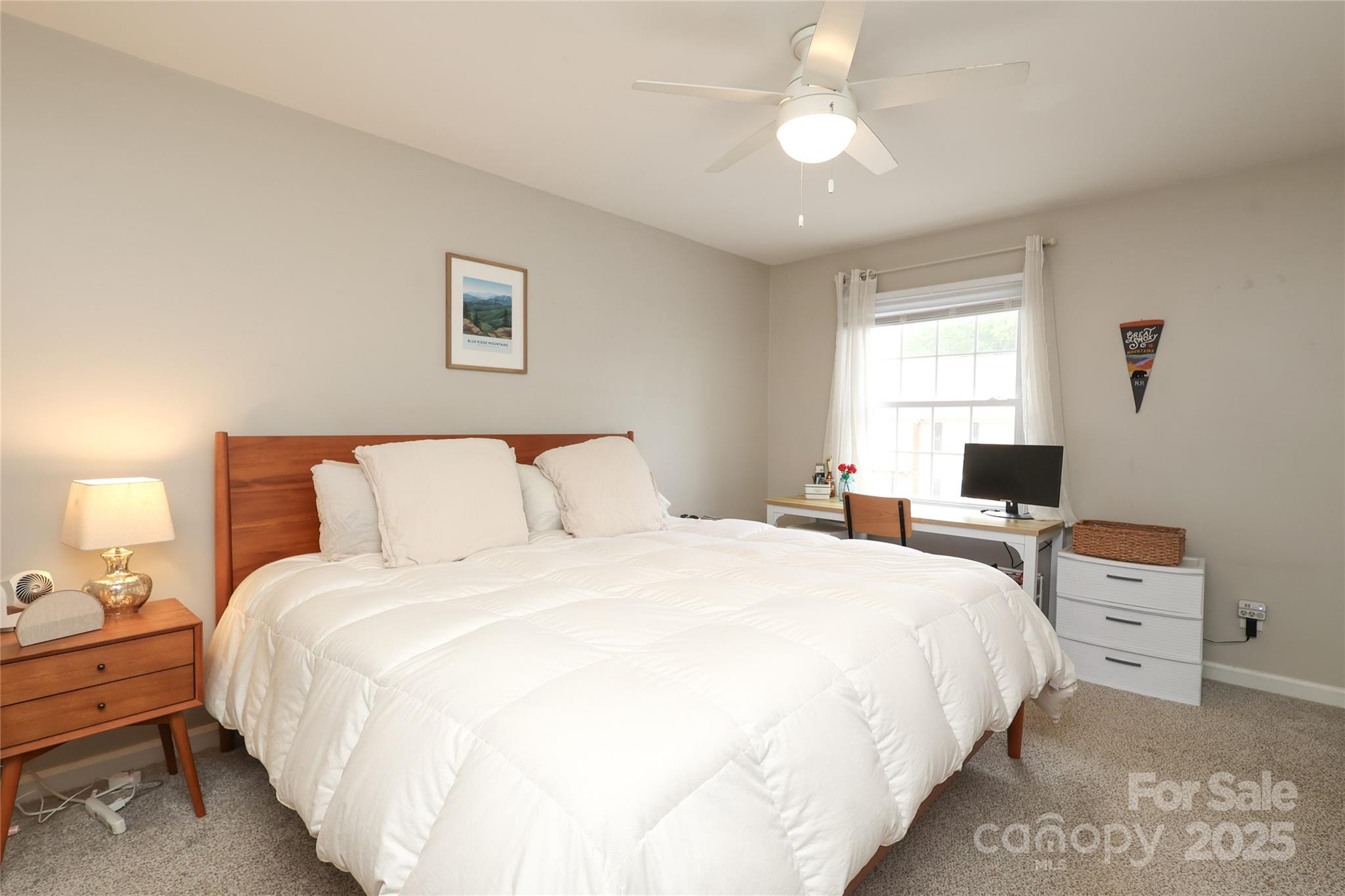 3722 Park Road, Unit B Charlotte, NC 28209 - Photo 14 of 48 a bedroom with bed and a chandelier