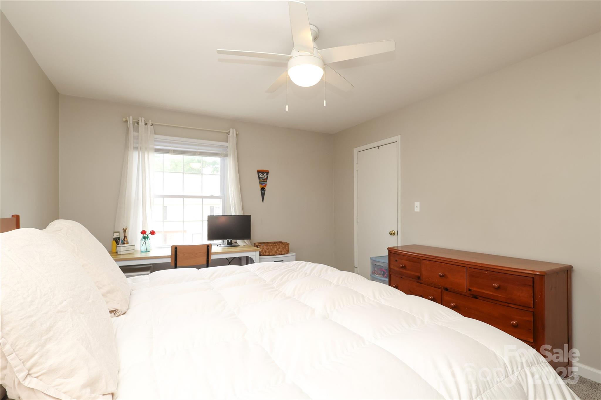 3722 Park Road, Unit B Charlotte, NC 28209 - Photo 16 of 48 a bedroom with a bed and a window