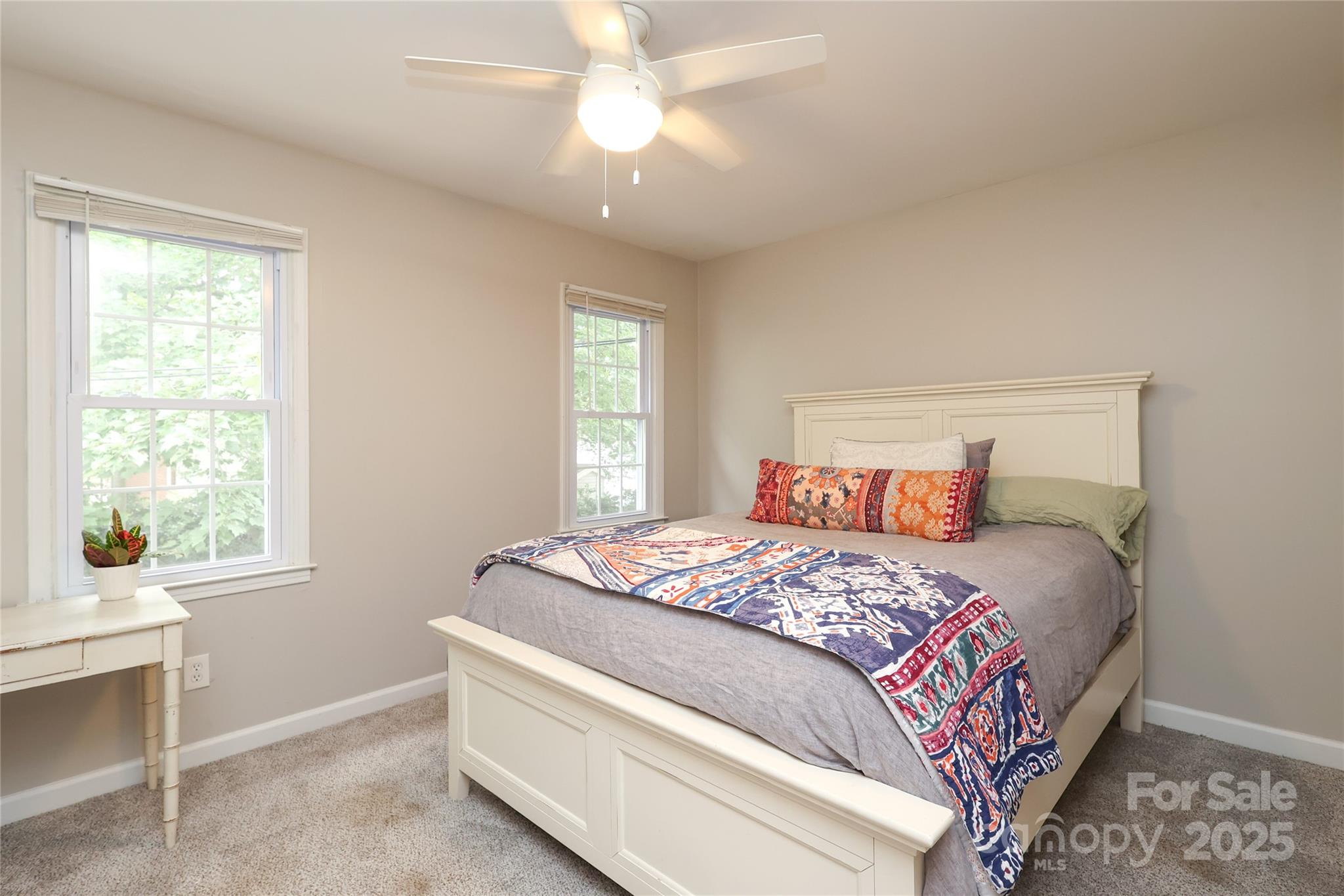 3722 Park Road, Unit B Charlotte, NC 28209 - Photo 19 of 48 a bedroom with a bed and a window