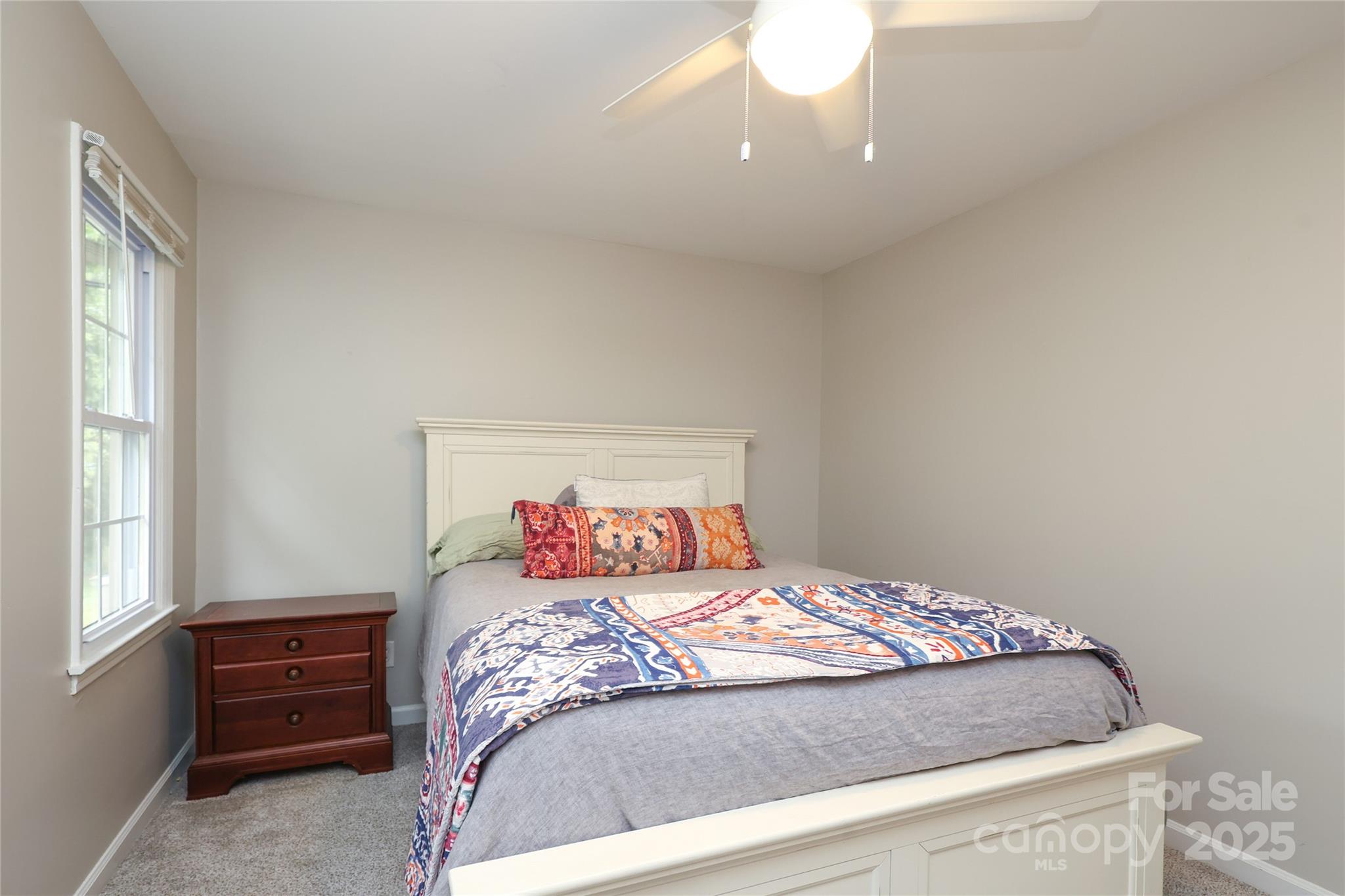 3722 Park Road, Unit B Charlotte, NC 28209 - Photo 21 of 48 a bedroom with a bed and a window