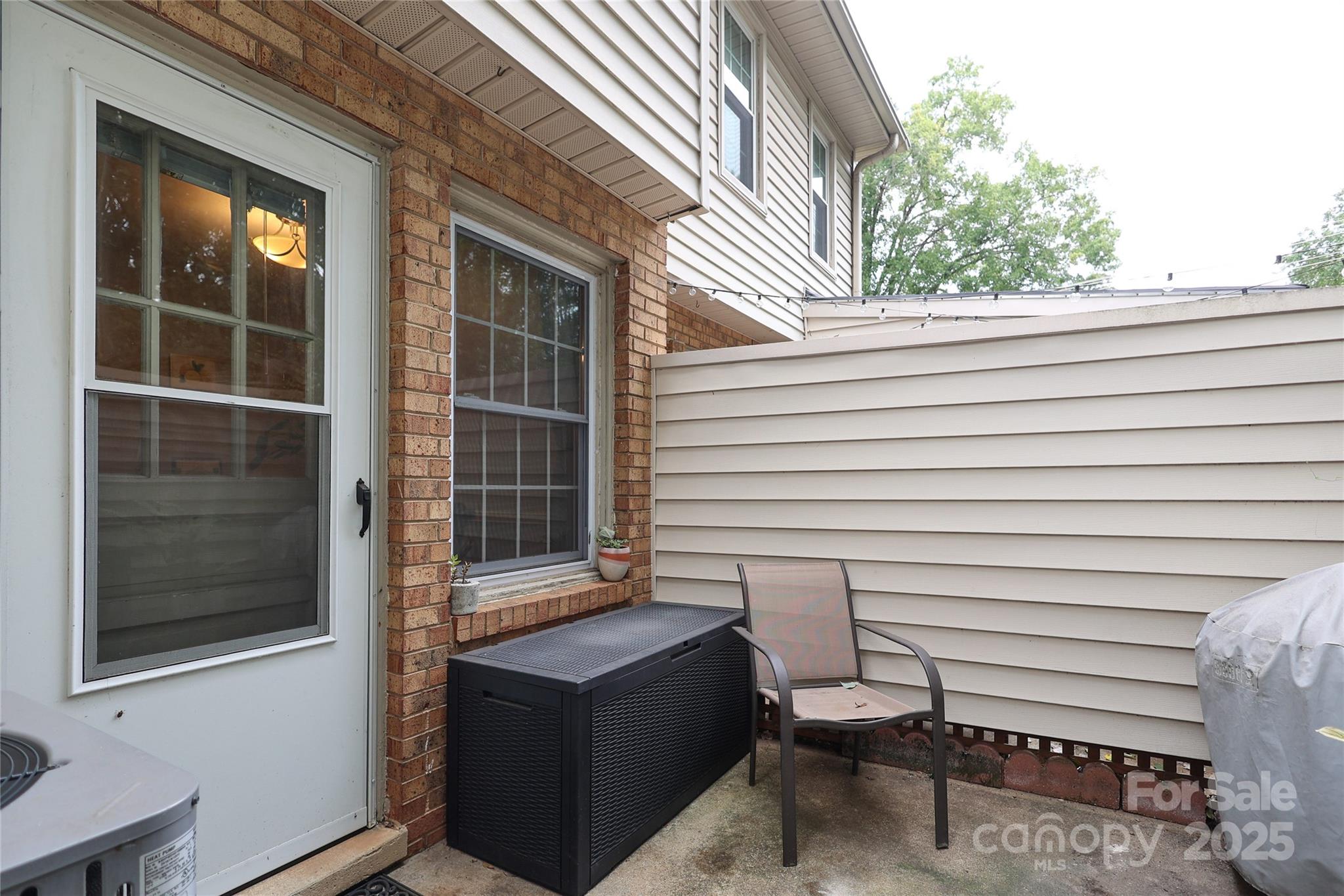 3722 Park Road, Unit B Charlotte, NC 28209 - Photo 25 of 48 a view of a house with a door and wooden walls