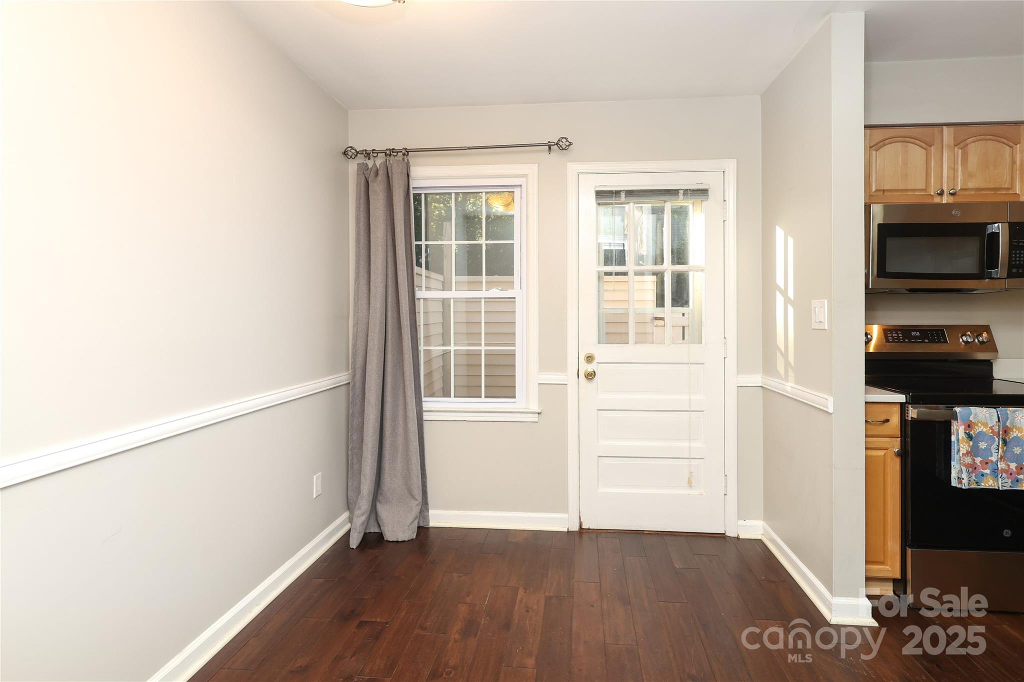 3722 Park Road, Unit B Charlotte, NC 28209 - Photo 31 of 48 a view of a hardwood floor in a room