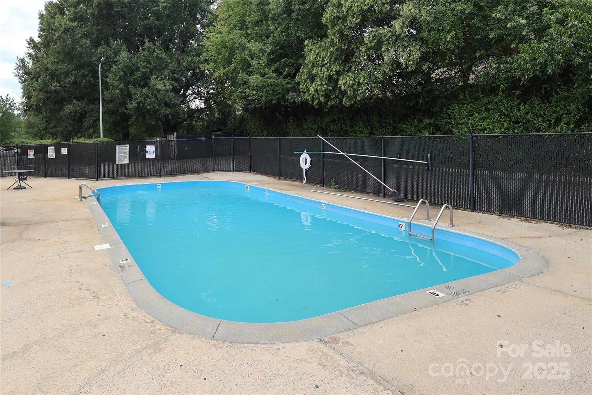 3722 Park Road, Unit B Charlotte, NC 28209 - Photo 45 of 48 a view of a swimming pool with a space