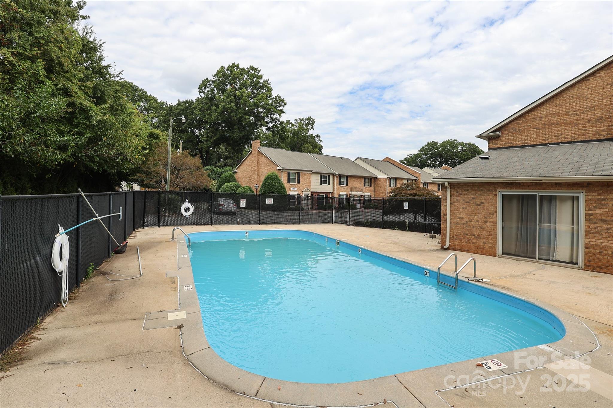 3722 Park Road, Unit B Charlotte, NC 28209 - Photo 46 of 48 a view of a swimming pool with a patio