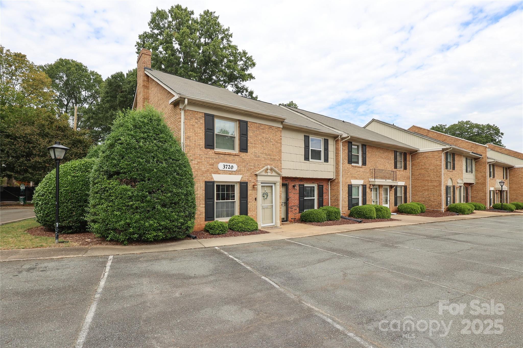 3722 Park Road, Unit B Charlotte, NC 28209 - Photo 47 of 48 a front view of a house with a garden