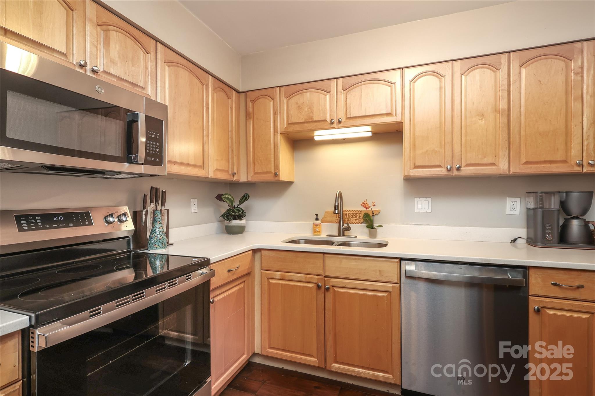 3722 Park Road, Unit B Charlotte, NC 28209 - Photo 8 of 48 a kitchen with stainless steel appliances granite countertop a sink and a stove