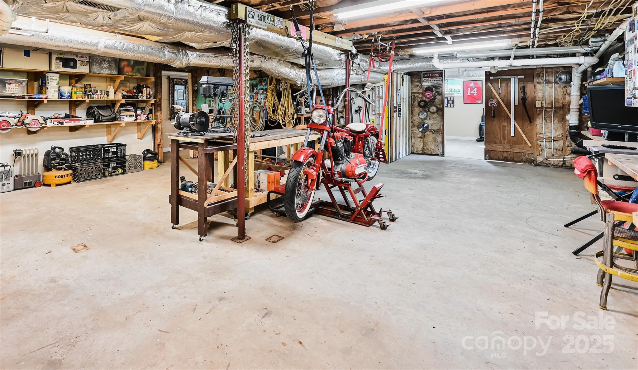402 Balsam Road Hendersonville, NC 28792 - Photo 19 of 26 a view of a storage room with racks