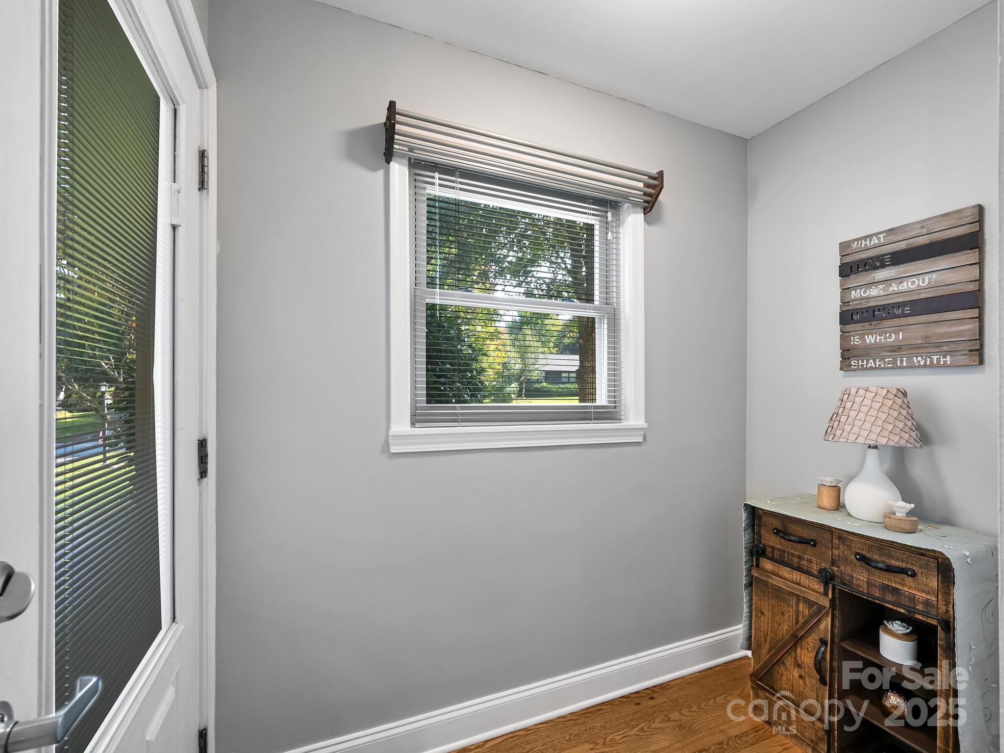 402 Balsam Road Hendersonville, NC 28792 - Photo 24 of 26 a room that has a window and a table in it