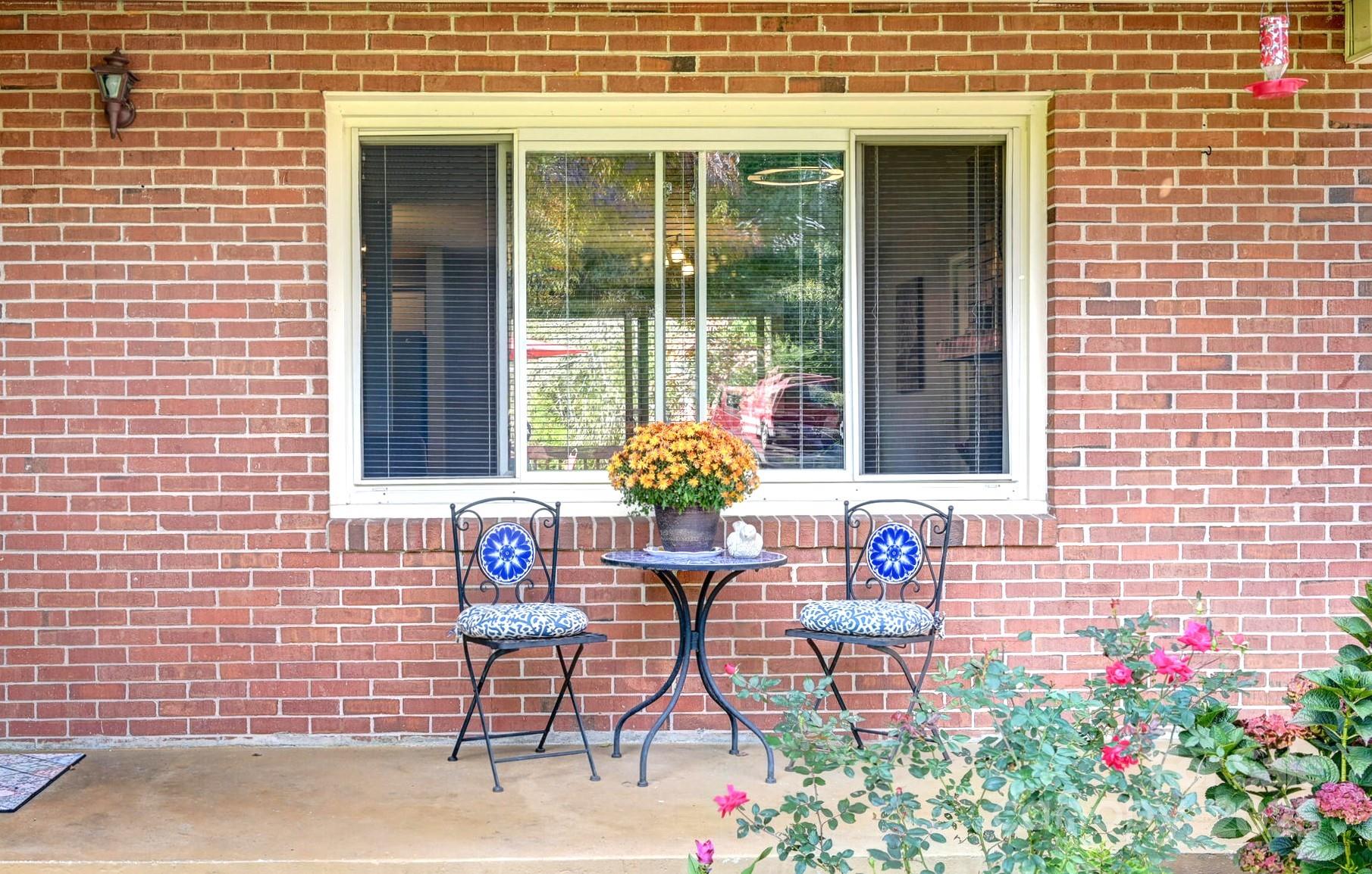 402 Balsam Road Hendersonville, NC 28792 - Photo 25 of 26 a view of house with outdoor seating