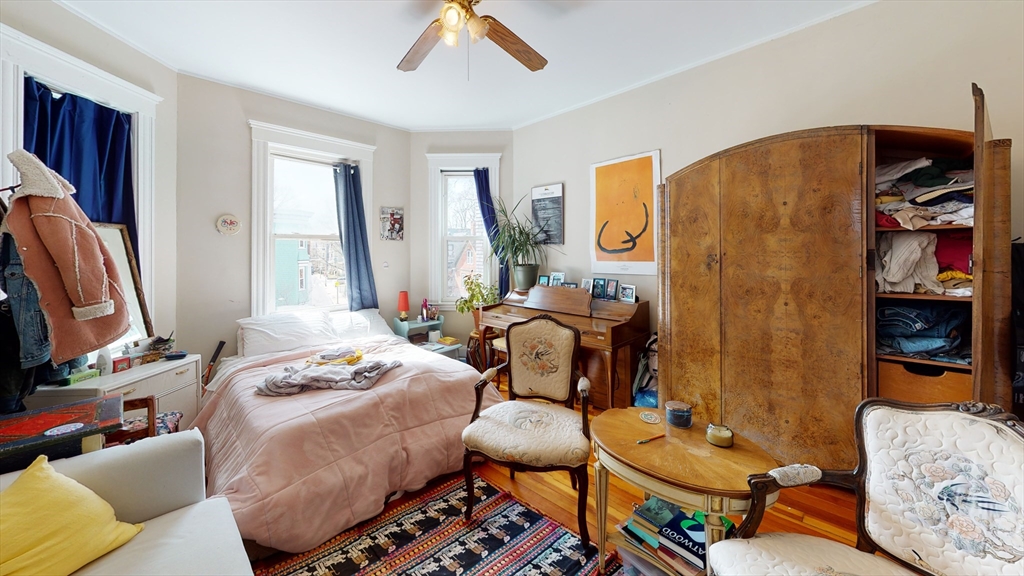 8 Olmstead Street, Unit 1 Boston, MA 02130 - Photo 5 of 11 a bedroom with furniture and a window