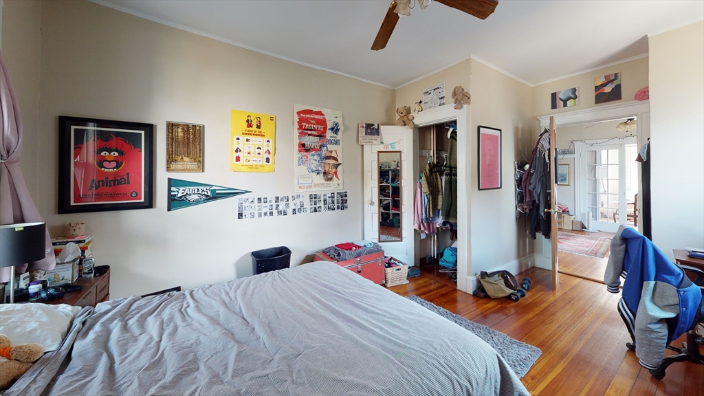 8 Olmstead Street, Unit 1 Boston, MA 02130 - Photo 9 of 11 a bedroom with bed and furniture