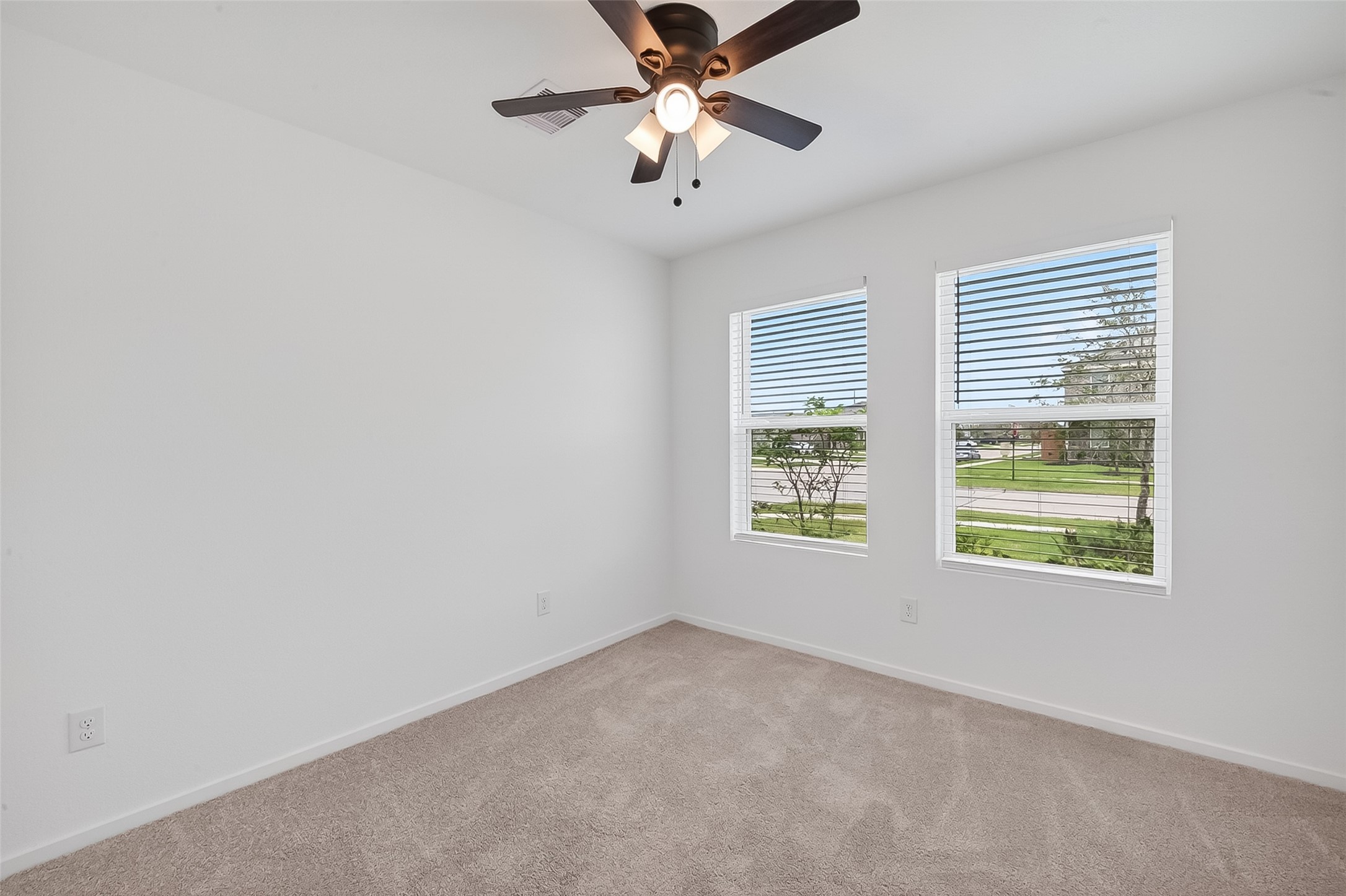 2623 American Ruby Drive Rosharon, TX 77583 - Photo 11 of 14 One of the secondary bedrooms located at the front of the house.