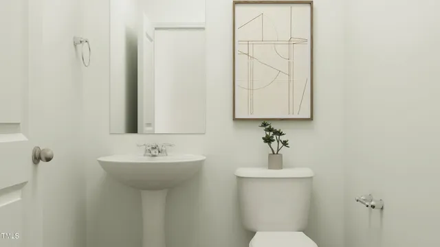 a bathroom with a sink a mirror and a toilet
