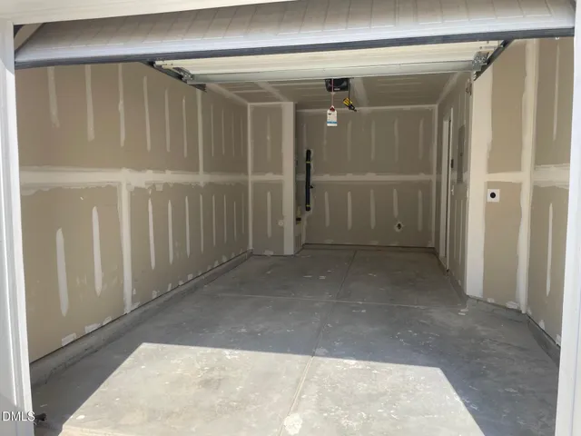 a view of a hallway with wooden shelves