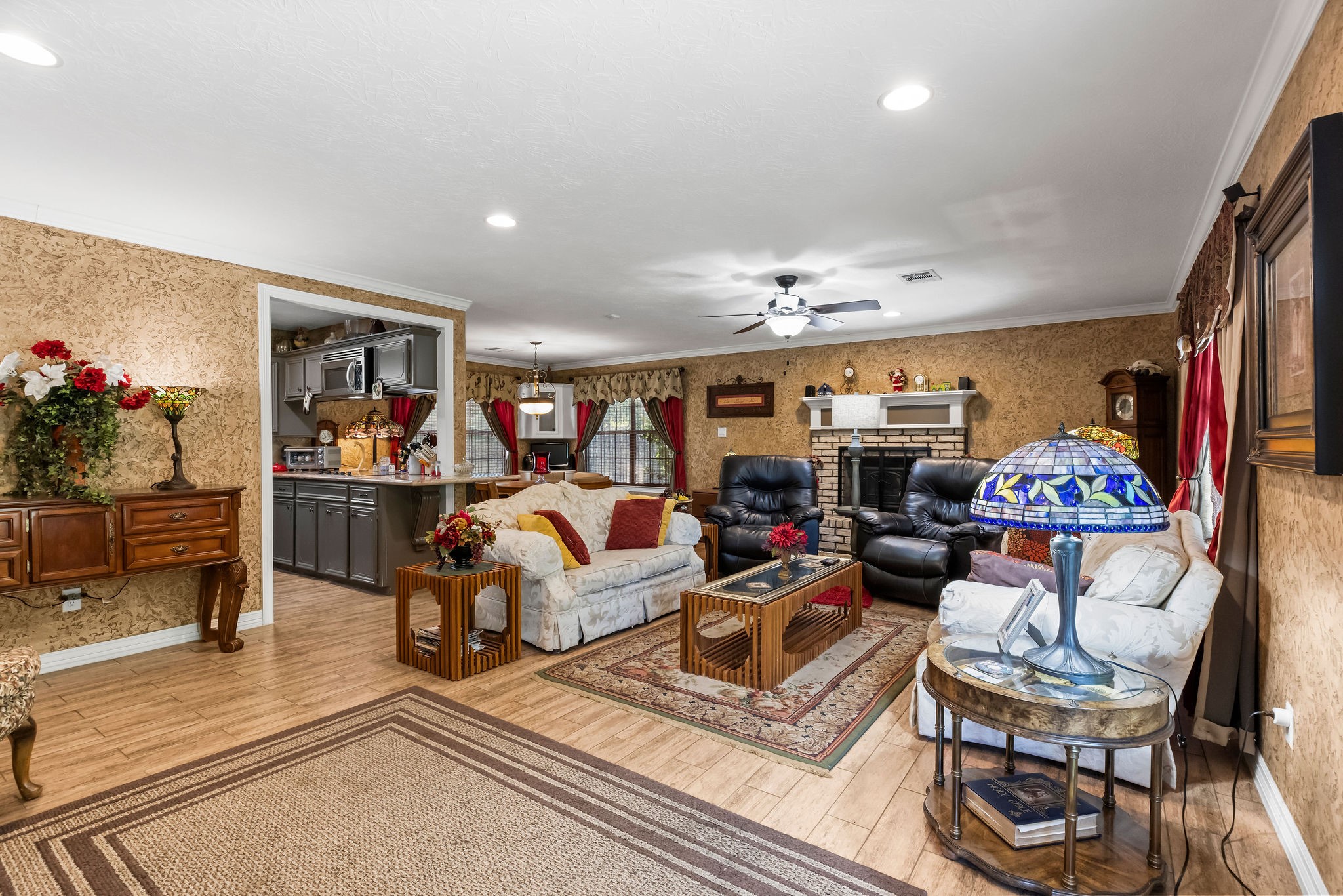 19094 FM 2854 Road Montgomery, TX 77316 - Photo 4 of 16 a living room with furniture and a flat screen tv
