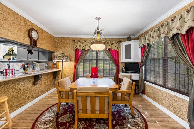 a view of a dining room with furniture