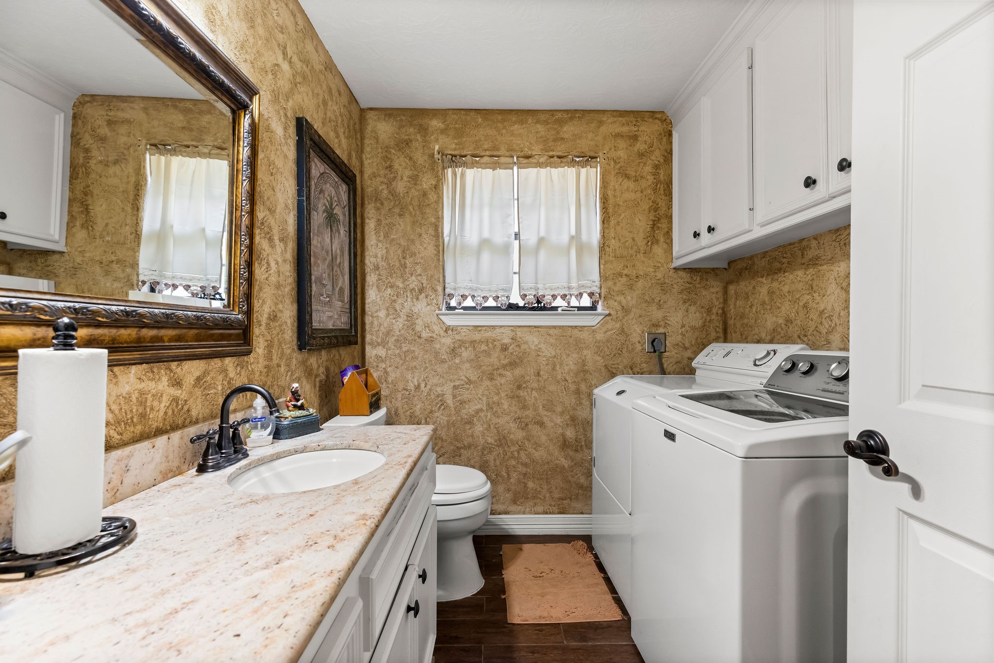 19094 FM 2854 Road Montgomery, TX 77316 - Photo 10 of 16 a bathroom with a sink and a washing machine