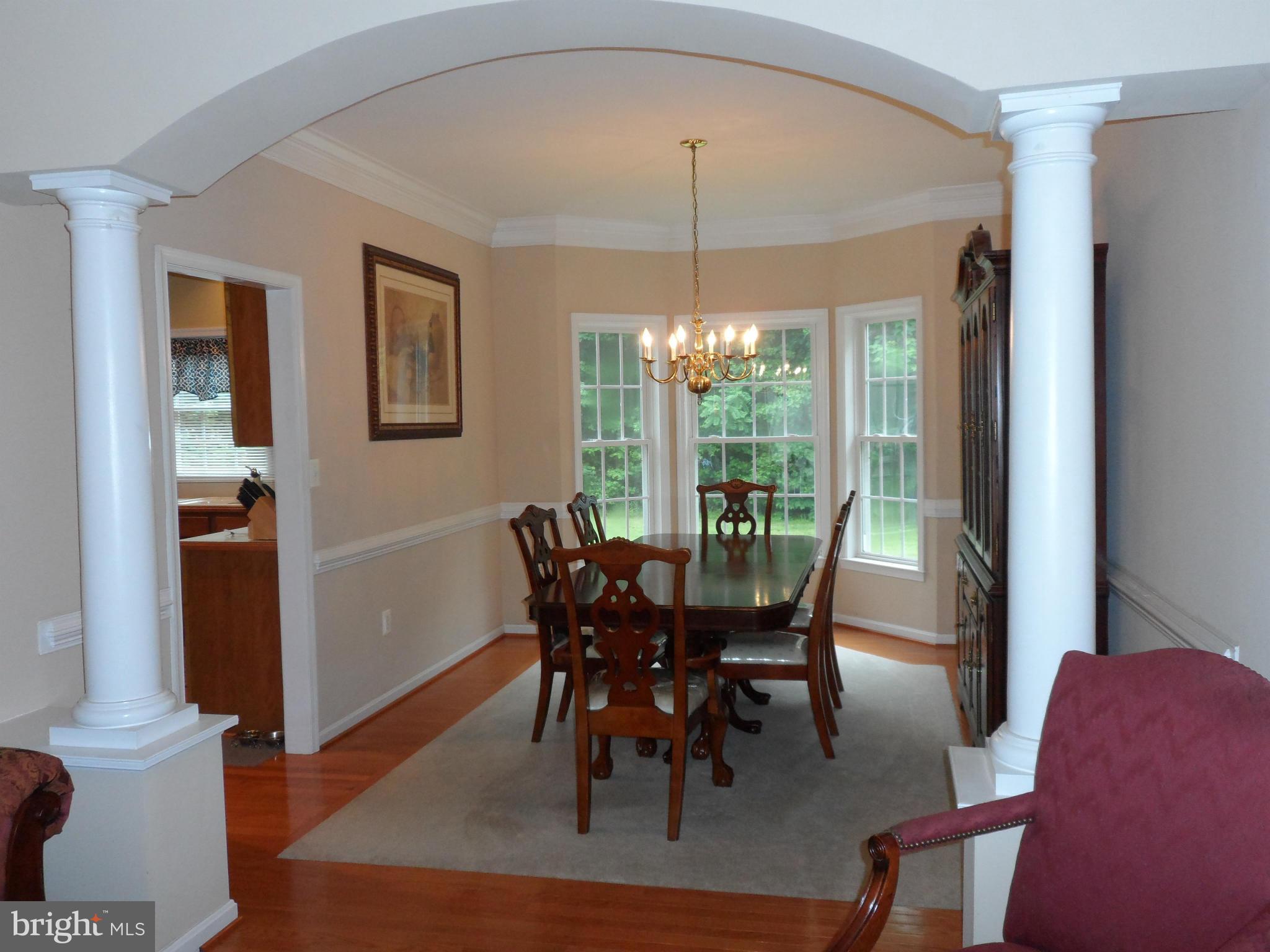 6941 Stuart Road King George, VA 22485 - Photo 7 of 22 Columned Formal Dining Room