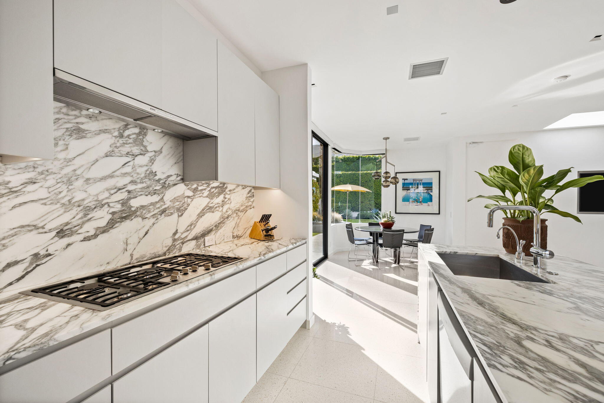 70149 Sonora Road Rancho Mirage, CA 92270 - Photo 25 of 74 a kitchen with a stove and a white counter top