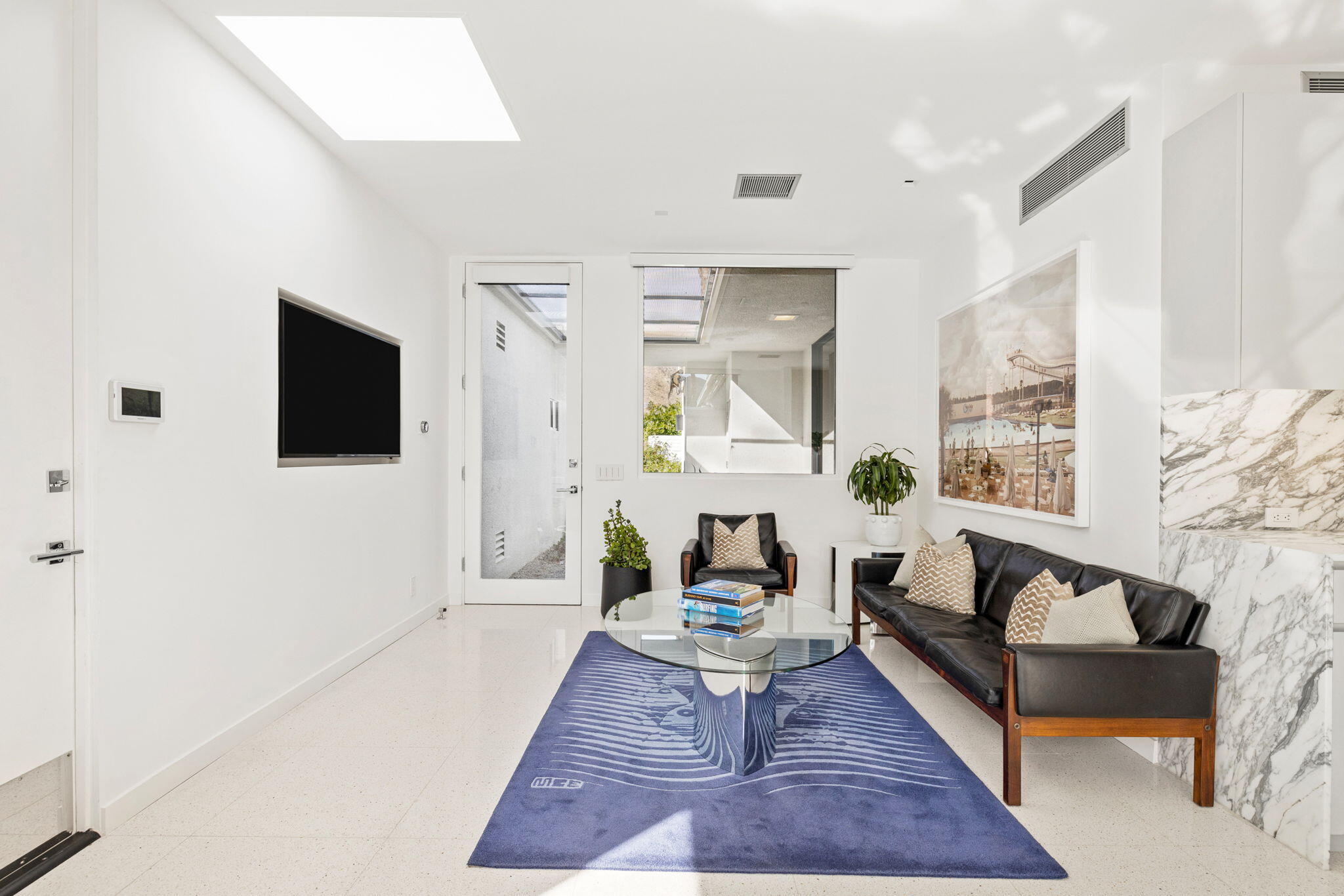 70149 Sonora Road Rancho Mirage, CA 92270 - Photo 26 of 74 a living room with furniture and a flat screen tv