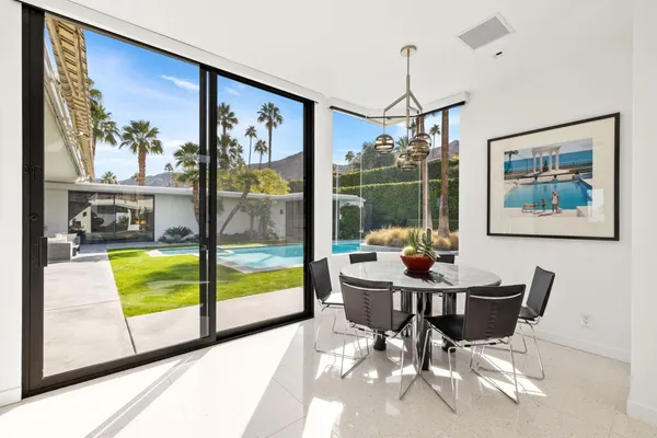 a living room with furniture and windows