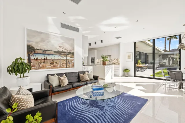 a view of a house with a tree