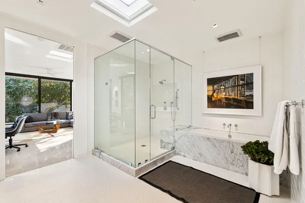 a view of an chairs and table in the patio