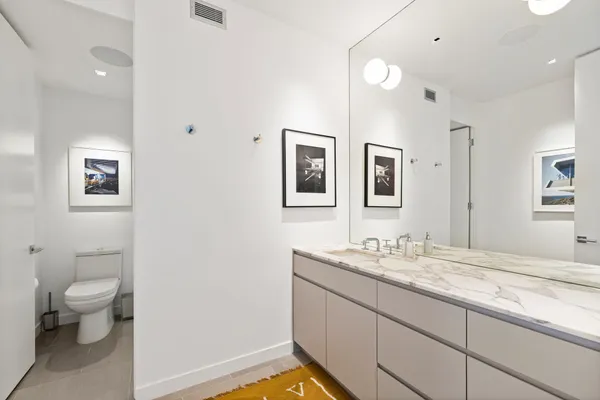 a view of a street with a building in the background