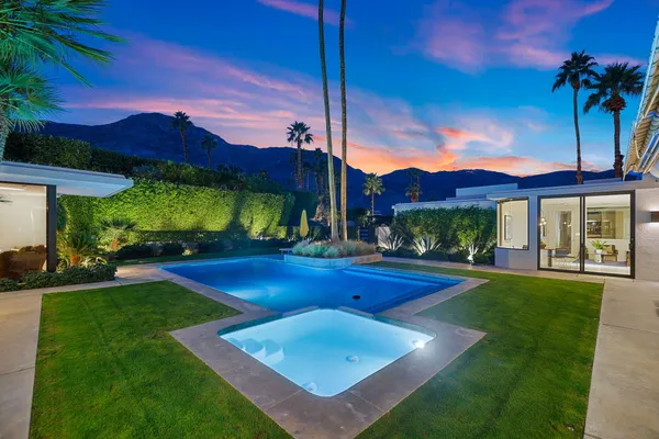 front view of a house with a small yard