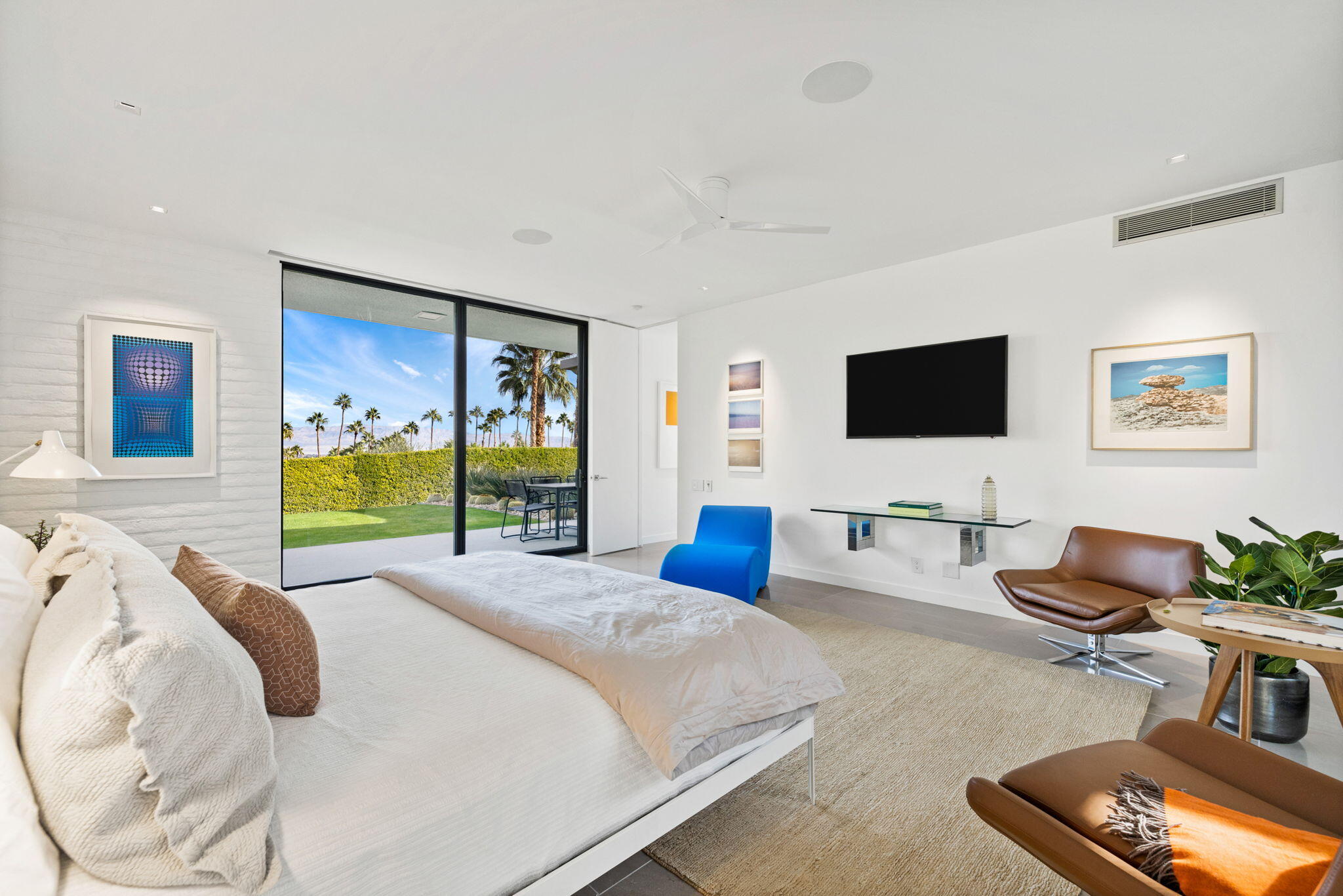 70149 Sonora Road Rancho Mirage, CA 92270 - Photo 53 of 74 a bedroom with furniture and a flat screen tv
