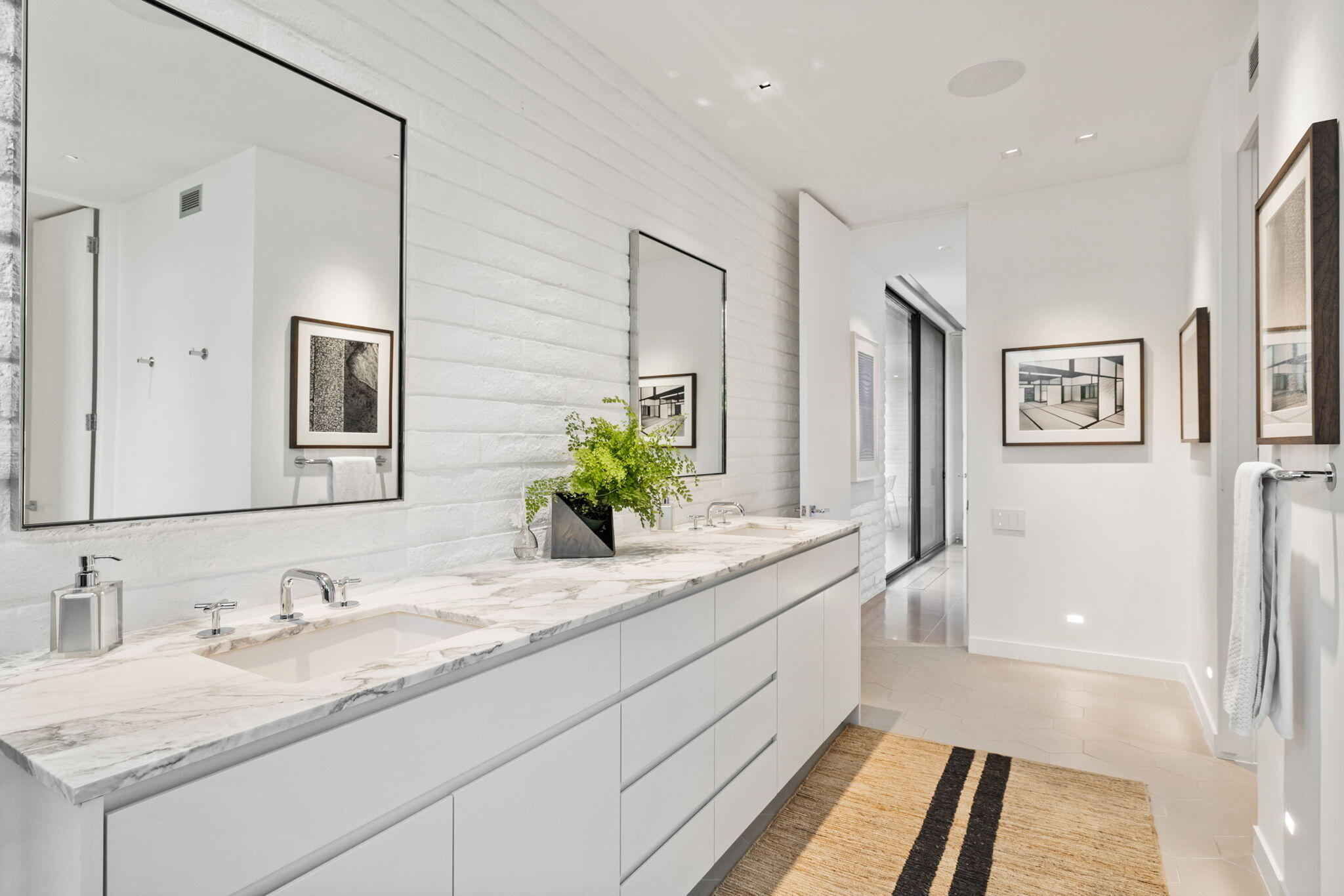 70149 Sonora Road Rancho Mirage, CA 92270 - Photo 54 of 74 a bathroom with a granite countertop sink and a mirror