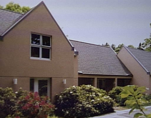 30 Baker Bridge Road Lincoln, MA 01773 - Photo 1 of 1 a front view of a house with a garden