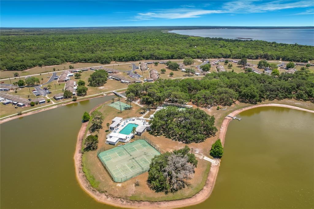 523 Club Circle Lake Wales, FL 33854 - Photo 23 of 25 an aerial view of a house with a lake view
