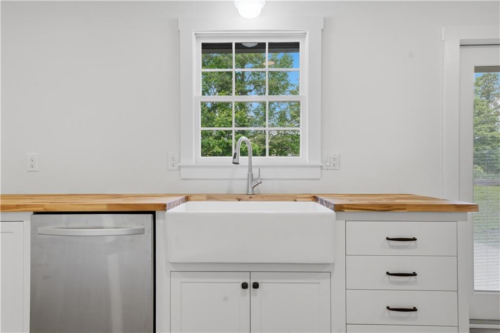 125 Childers Road Canton, GA 30115 - Photo 22 of 48 a utility room with closet and a window