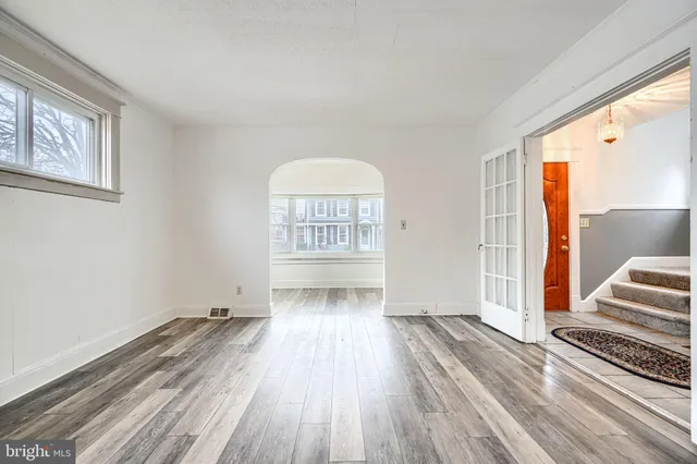 a view of livingroom with hardwood floor and hallway