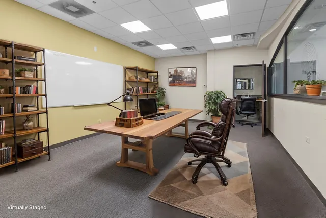 a view of a room with a large window