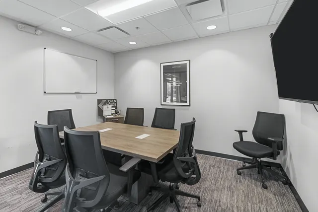 a kitchen with a large window and a sink