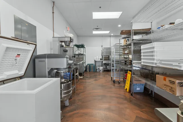 a room with fireplace and a table